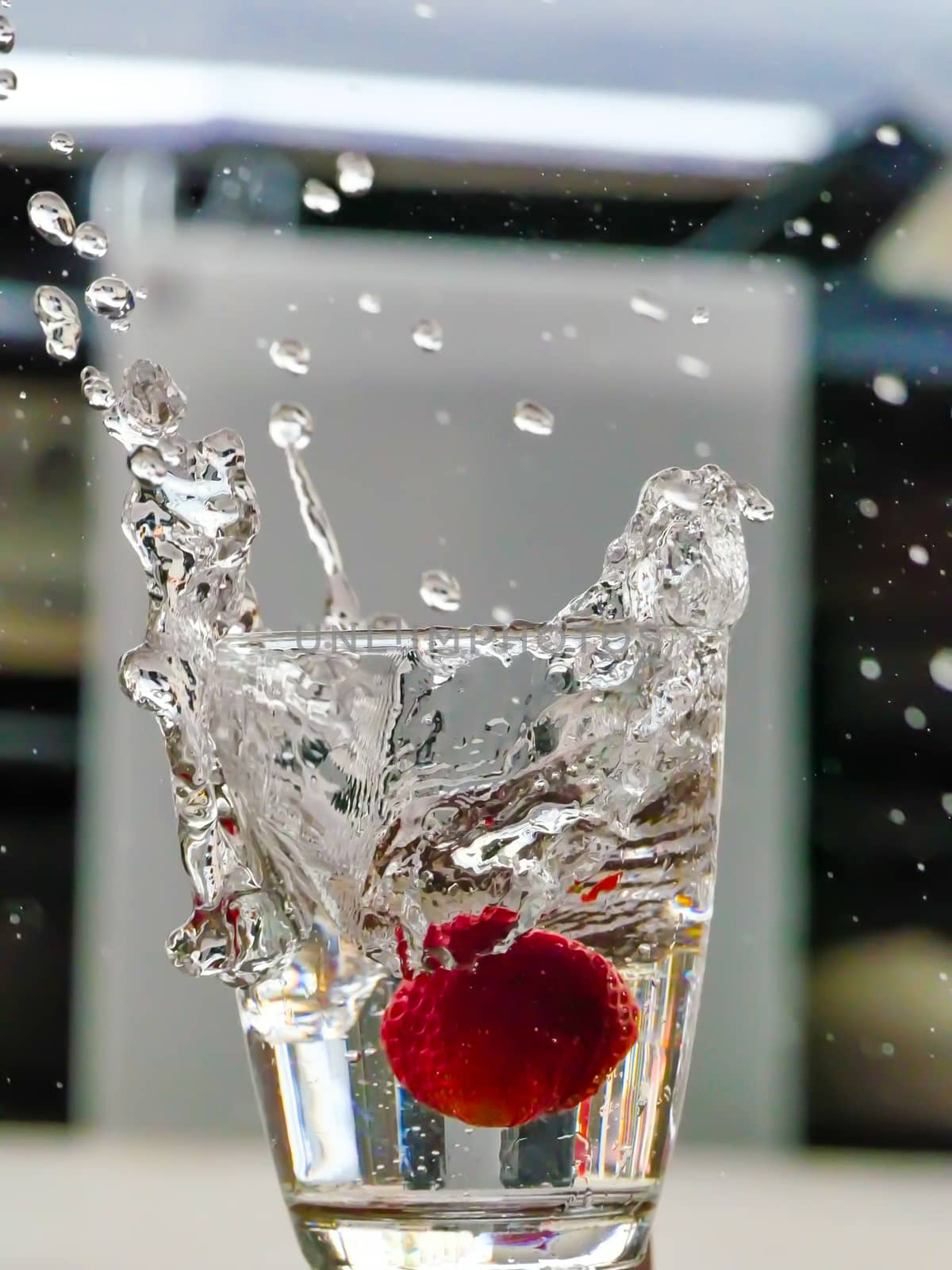 Strawberry Water splash in glass