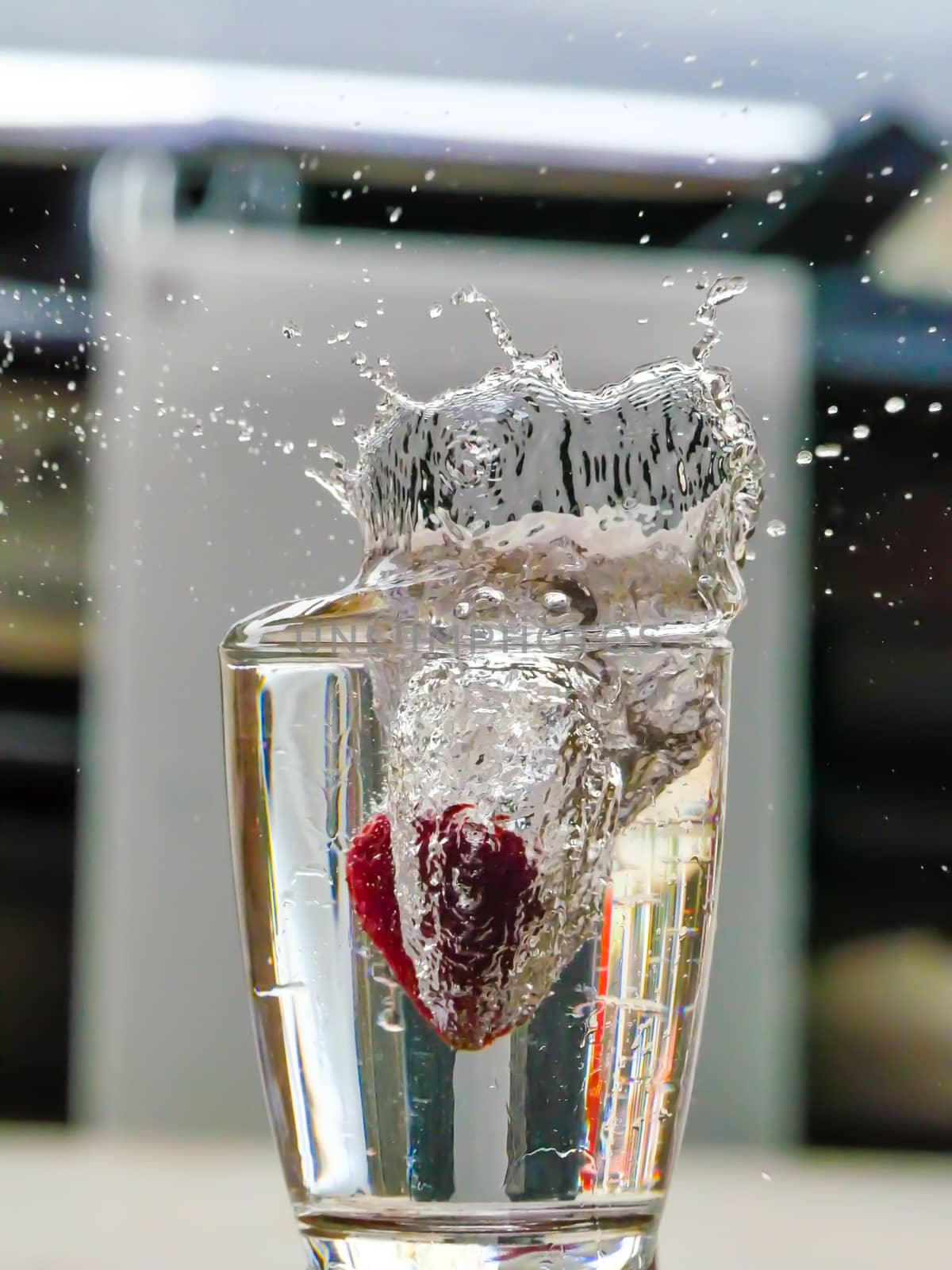 Strawberry Water splash in glass