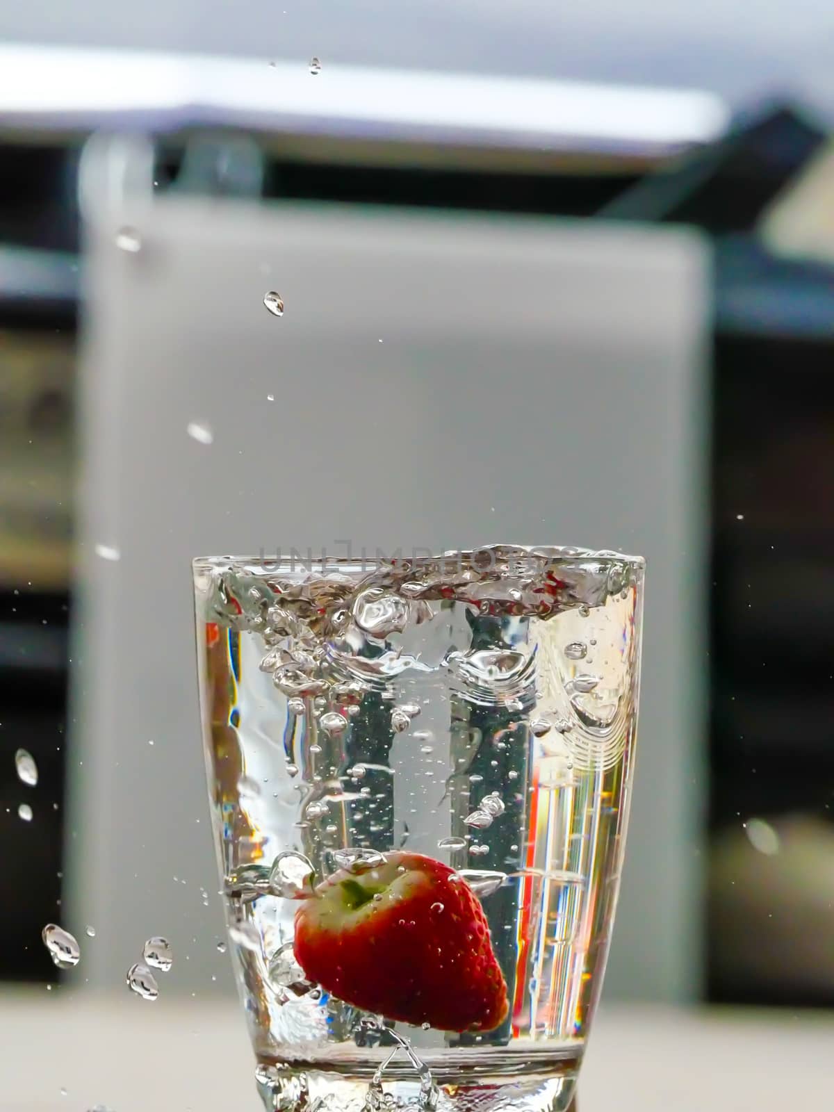 Strawberry Water splash in glass