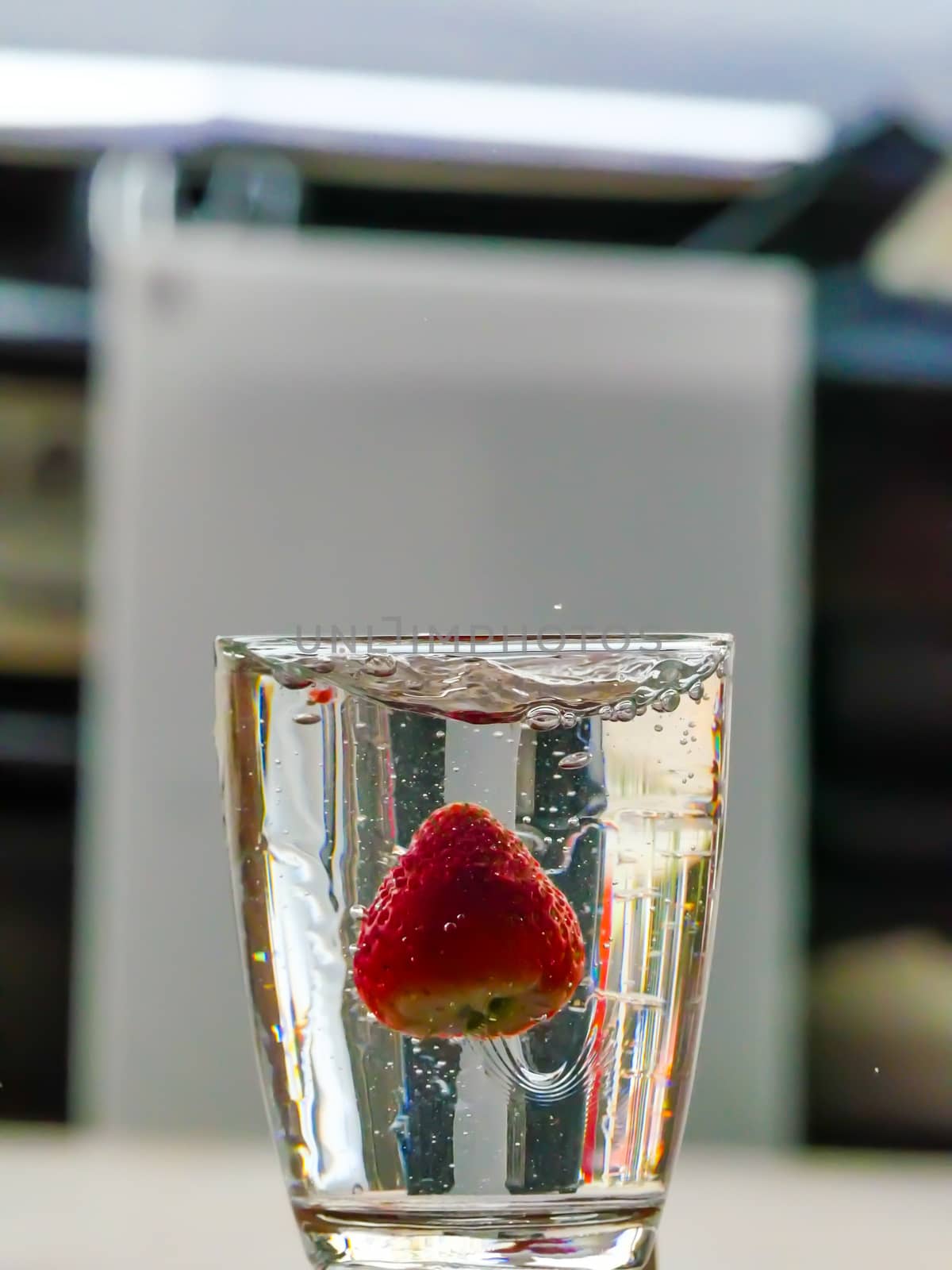 Strawberry Water splash in glass