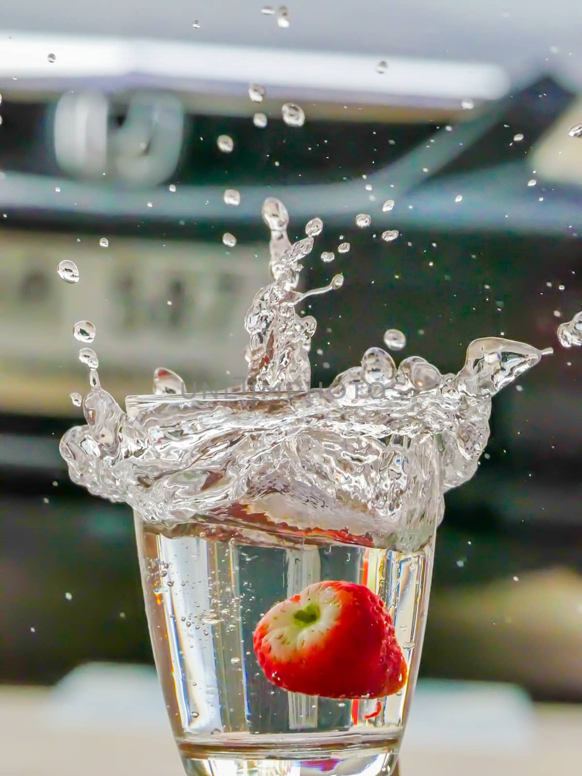 Strawberry Water splash in glass