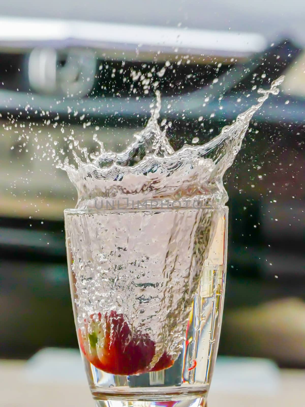 Strawberry Water splash in glass