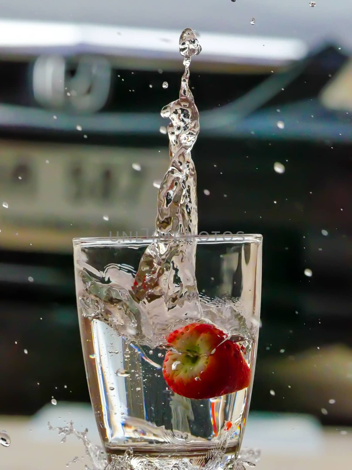 Strawberry Water splash in glass