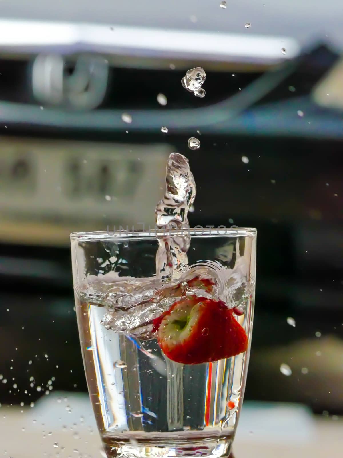 Strawberry Water splash in glass