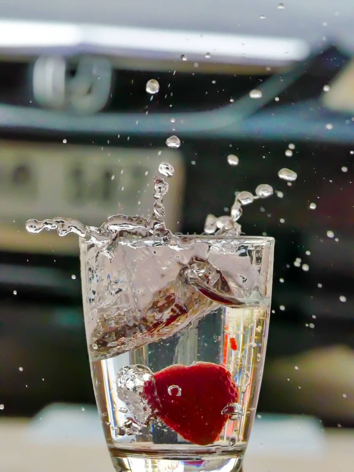 Strawberry Water splash in glass