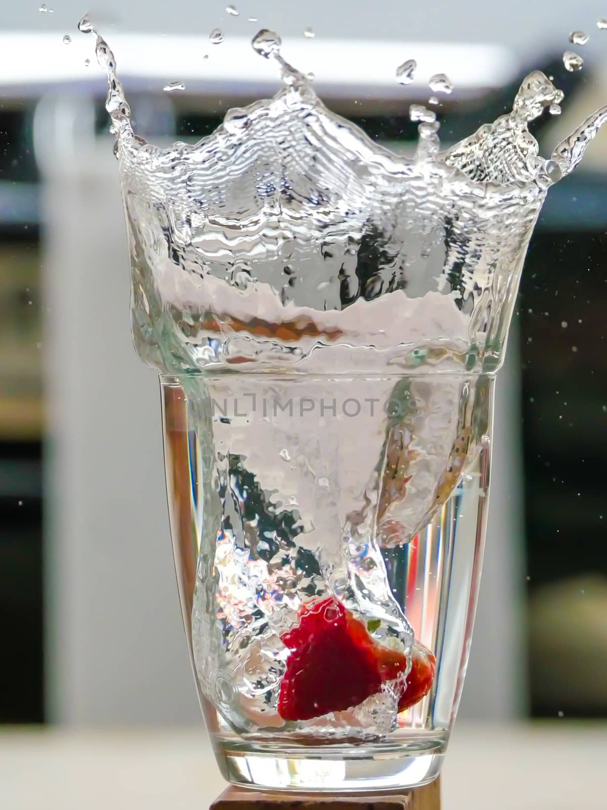 Strawberry Water splash in glass