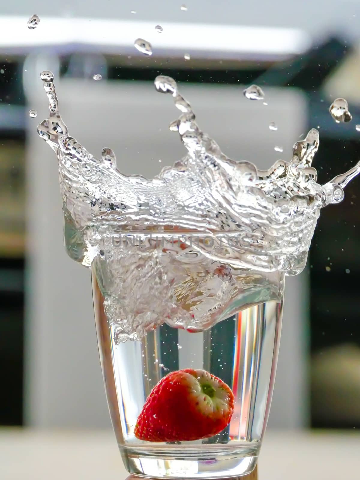 Strawberry Water splash in glass