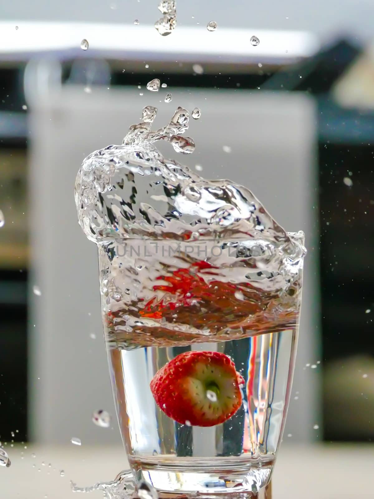 Strawberry Water splash in glass