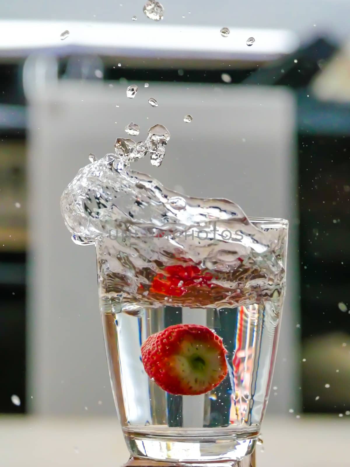 Strawberry Water splash in glass