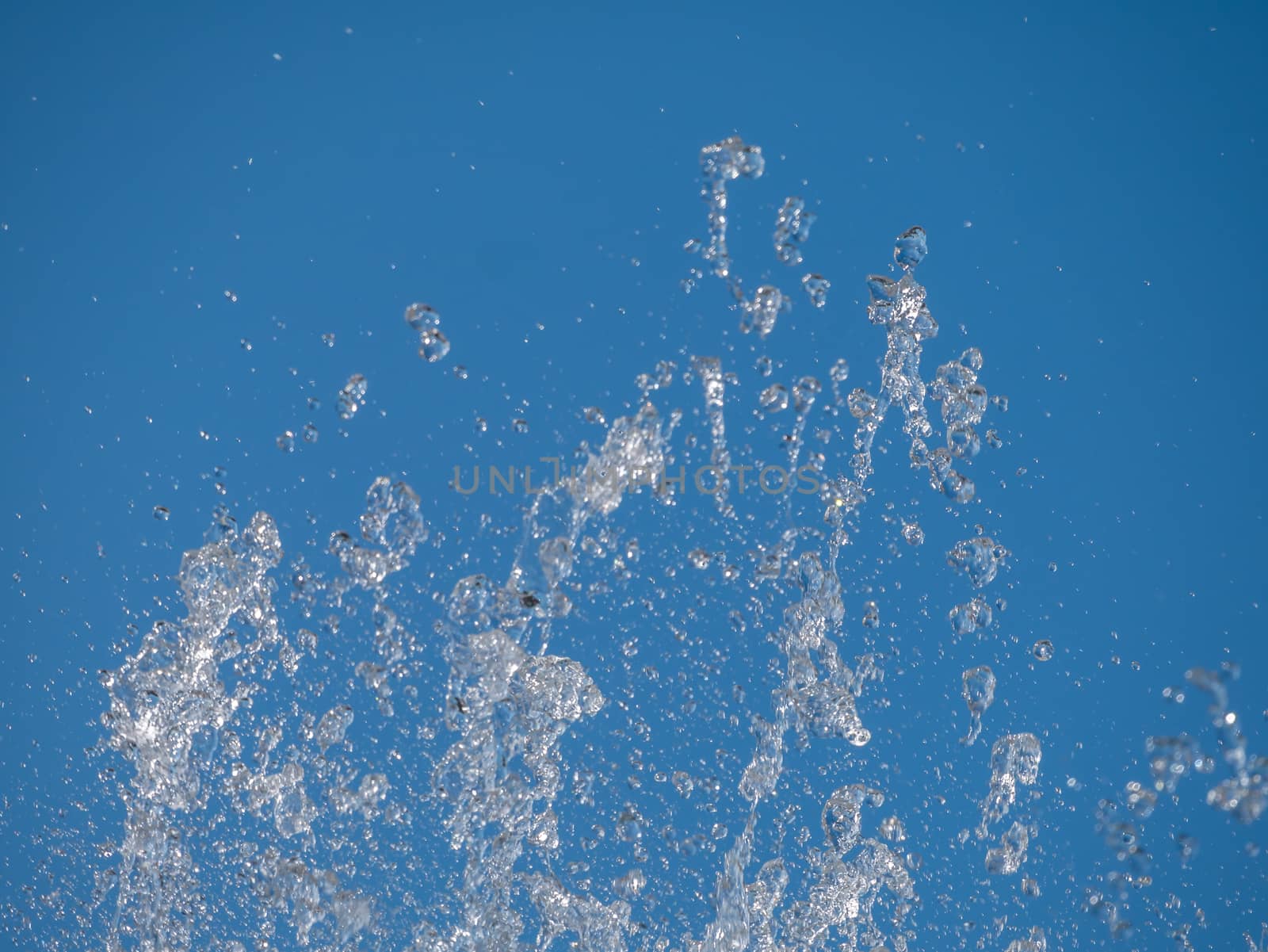 Water splash With blue background