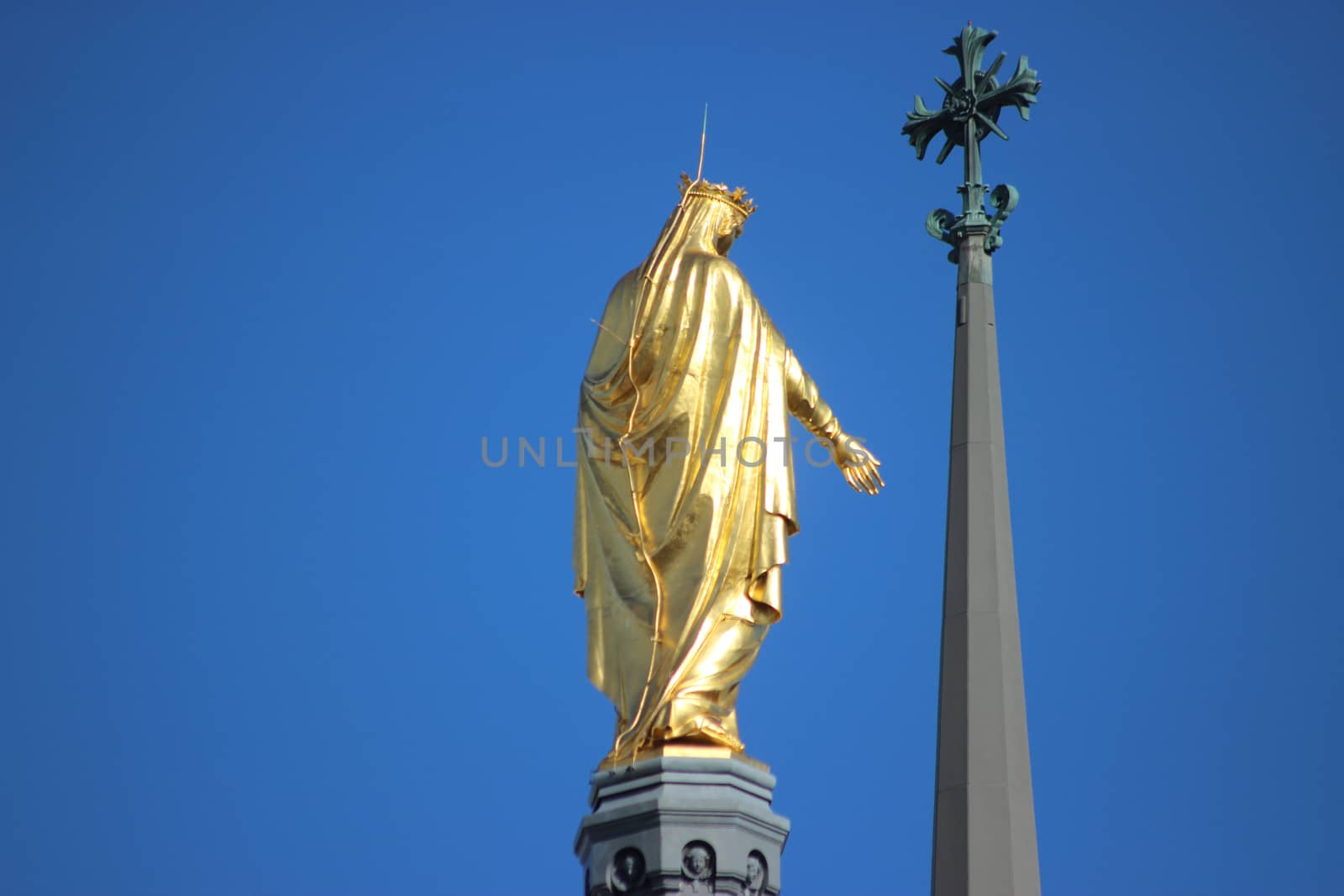 Closeup of the Golden Statue of the Virgin Mary (back view). Basilica of Notre-Dame de Fourviere in Lyon,
