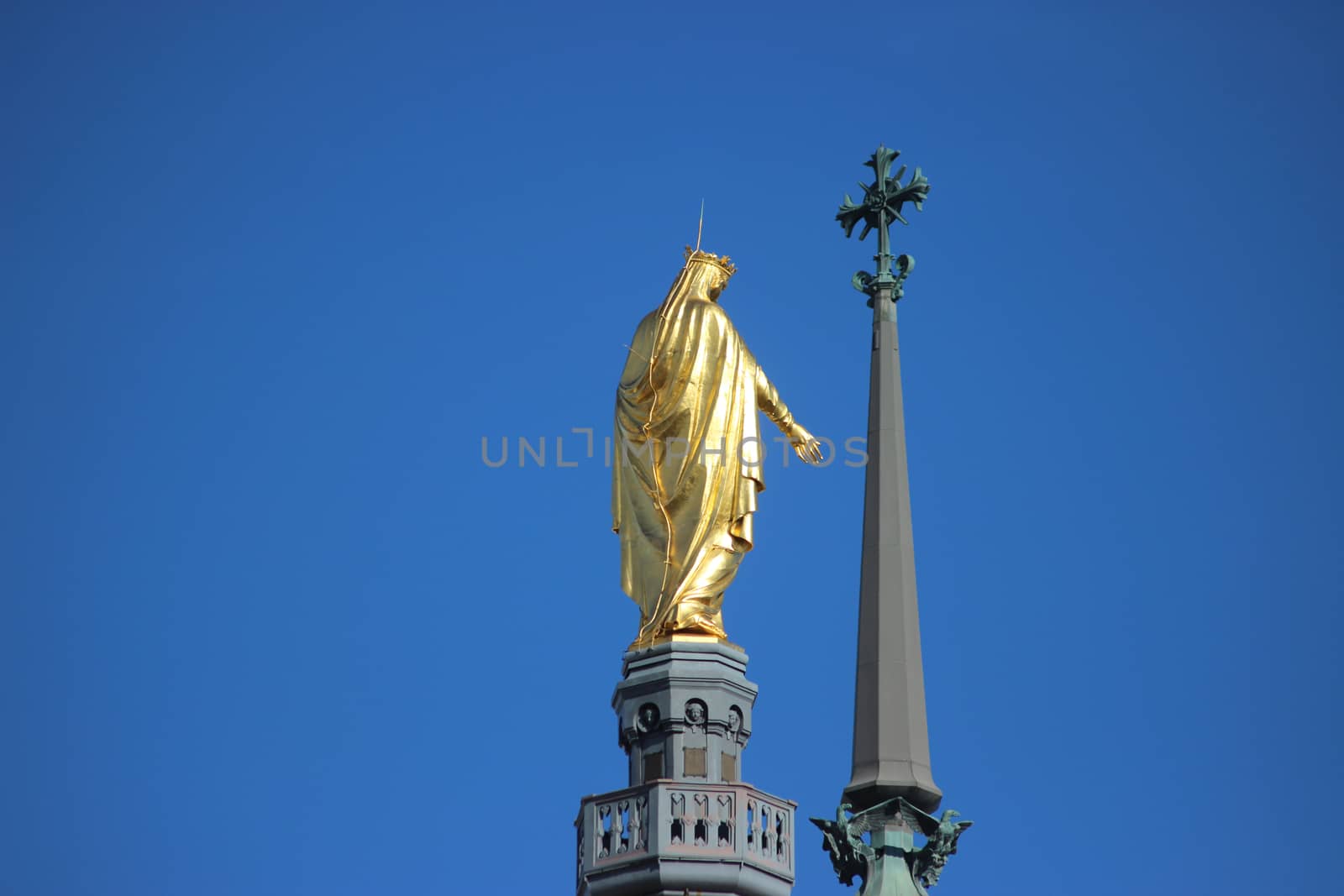 Golden Statue of the Virgin Mary (back view). Basilica of Notre-Dame de Fourviere in Lyon,