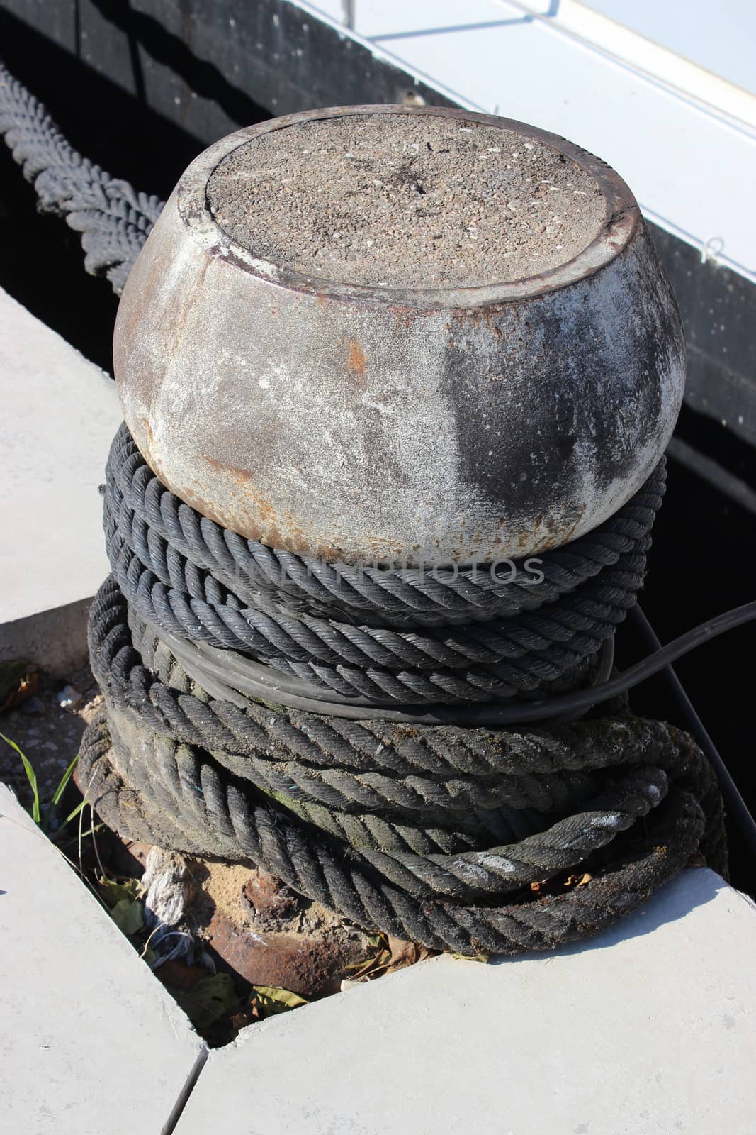 Bollard with mooring lines. Harbor of Confluence in Lyon, France