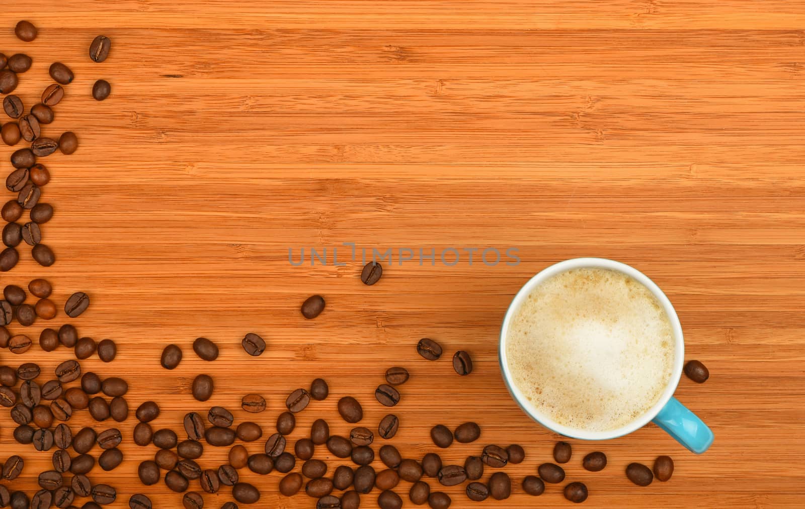 Coffee cup and beans over wood background by BreakingTheWalls