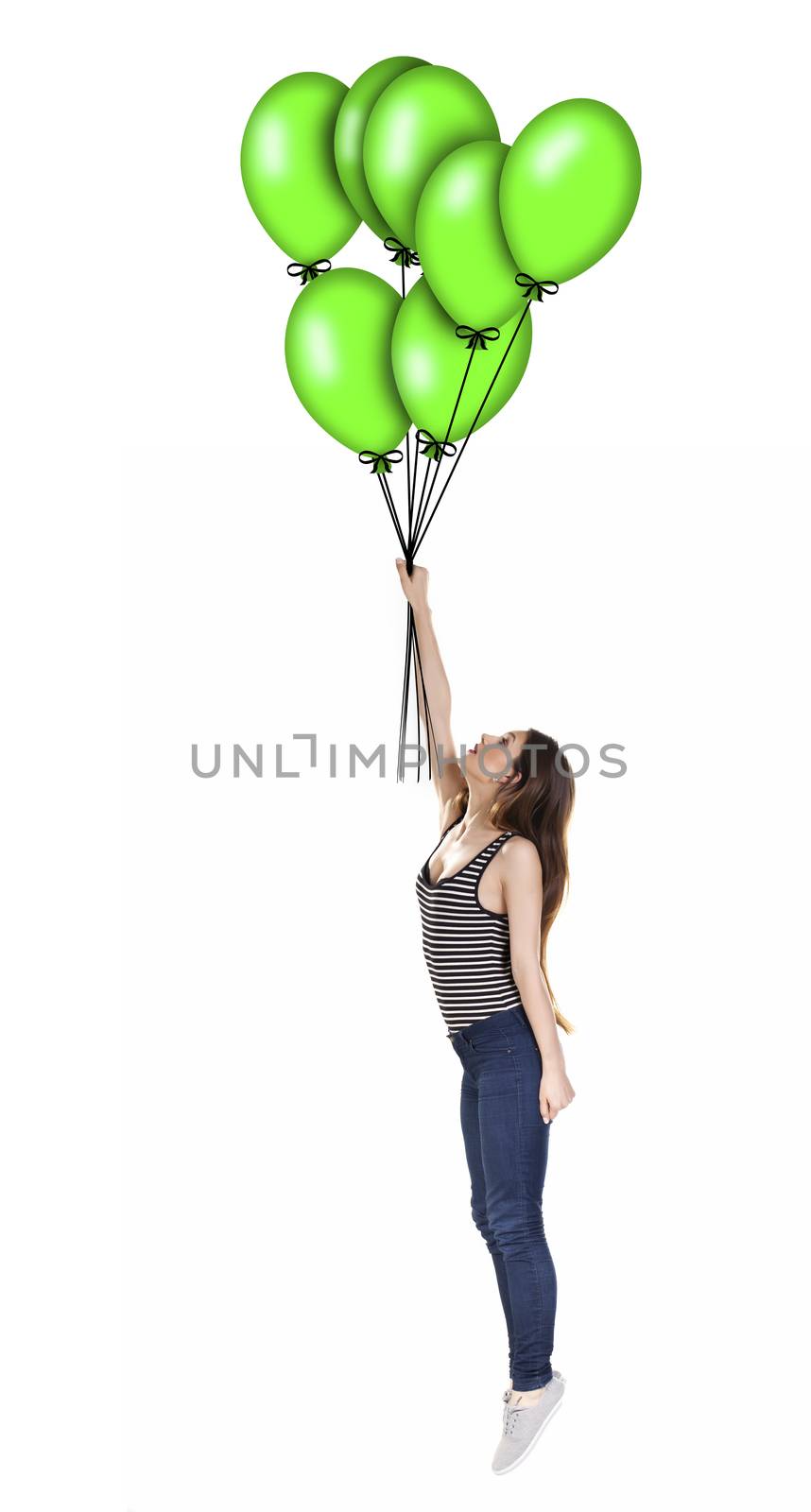 Woman being lifted up in the air by balloons.