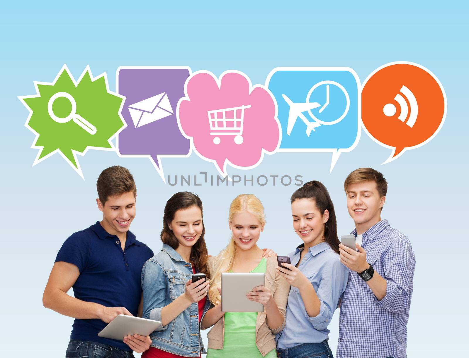 people, communication and technology concept - smiling friends with smartphones and tablet pc computers over blue background with doodles