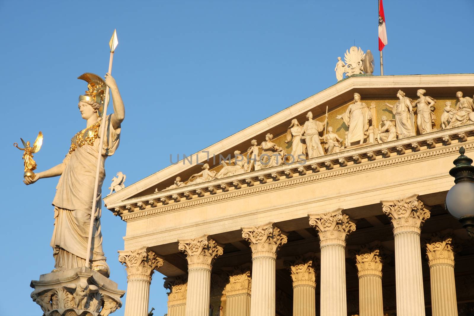 The Austrian Parliament and statue of Pallas Athena in Vienna, Austria