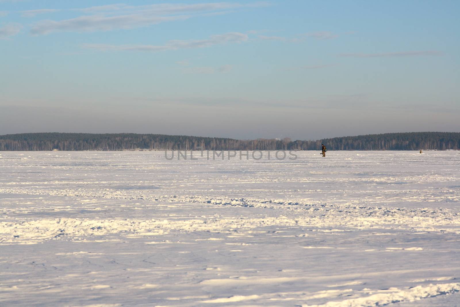 Fishermans on ice for fishing with equipments
