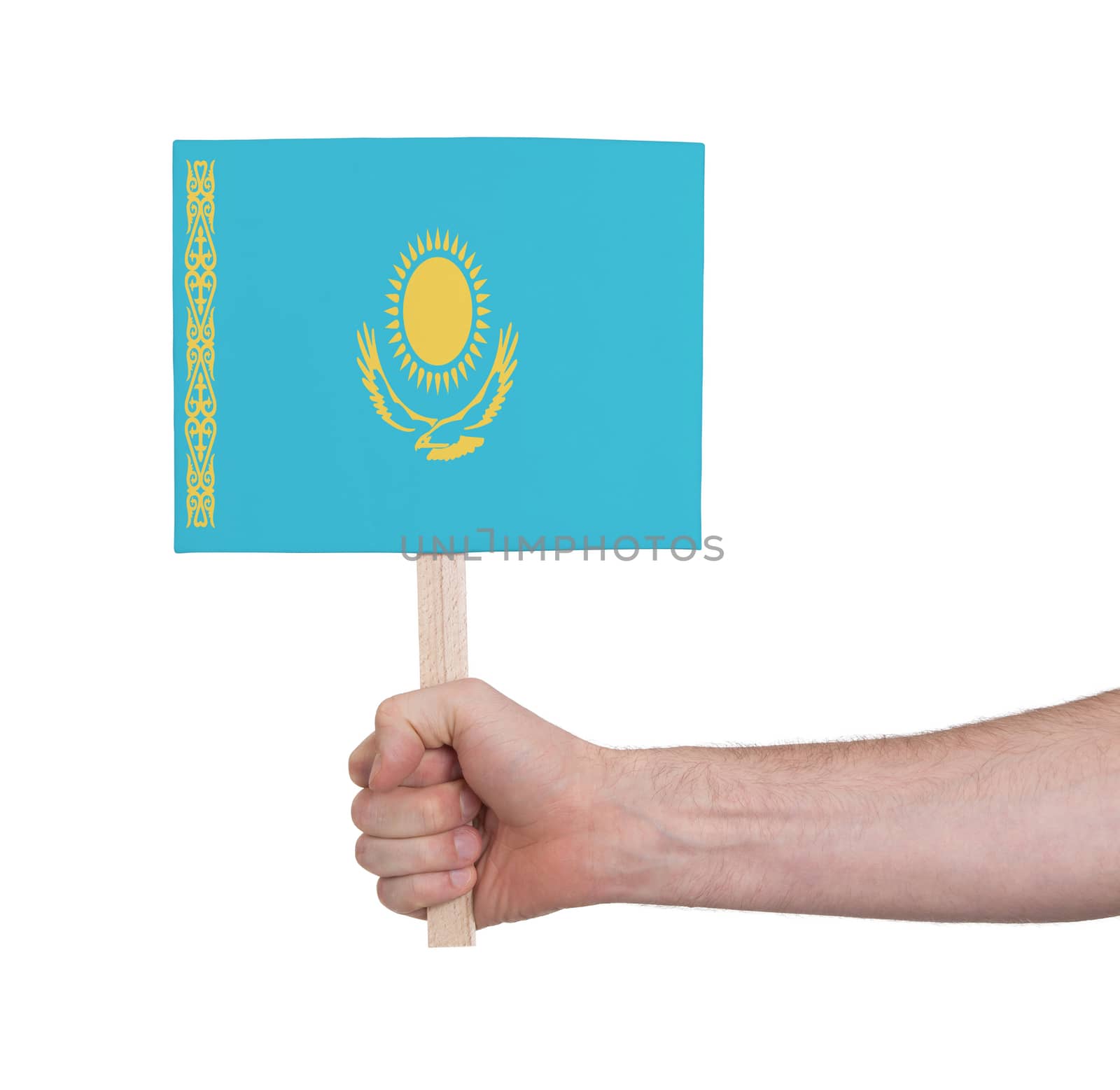 Hand holding small card - Flag of Kazakhstan by michaklootwijk