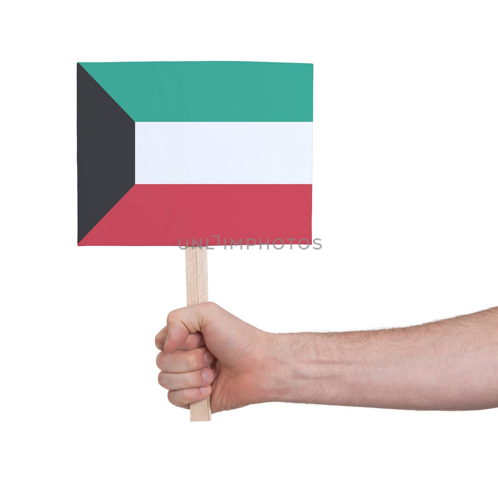 Hand holding small card - Flag of Kuwait by michaklootwijk
