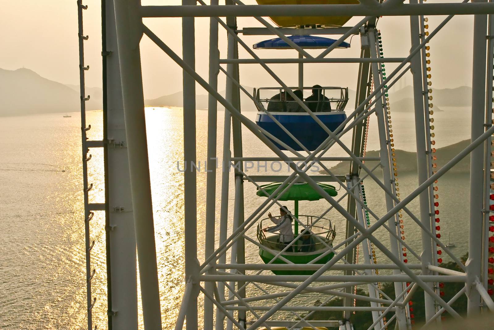 A first view on Ferris wheel in Hong Kong under sunset