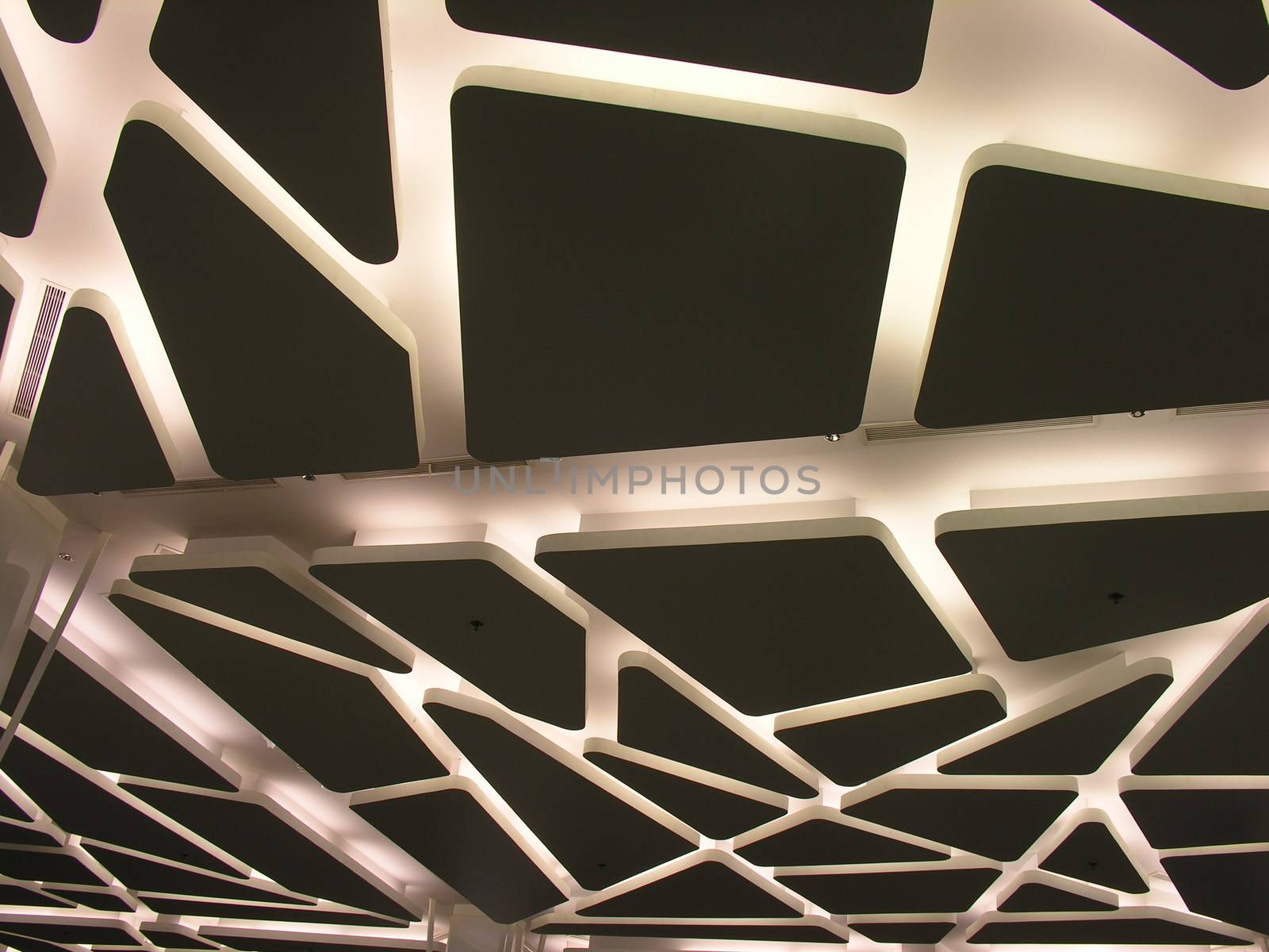 View of a suspended futuristic ceiling with modern lighting by Hepjam