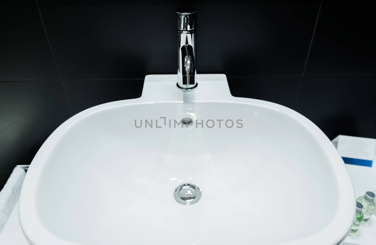Modern Bathroom Bowl Sinks and Black Tiles Bathroom Interior Design.