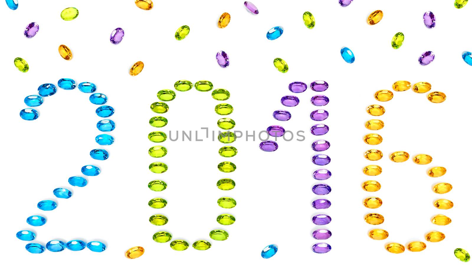 New Year 2016. Christmas. Jewelry digits, colorful precious stones placer closeup isolated. Gems Topaz, Amethyst, Citrine, Peridot, vivid multicolored unusual greeting card. Sparkling happy holiday 