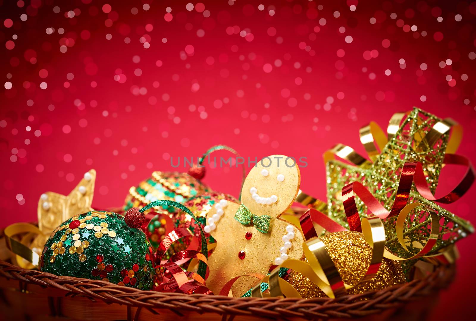 New Year 2016. Merry Christmas. Party festive decoration, gingerbread balls stars serpentine, in basket, handmade, bokeh. Happy holiday. Vivid greeting card, multicolored, green red gold, copyspace