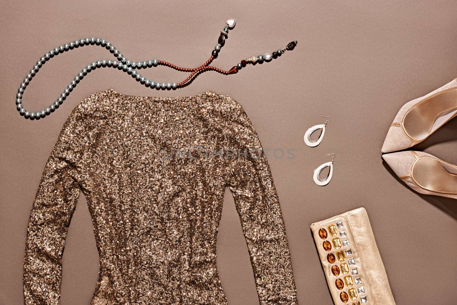Fashion clothes stylish set, blue sequins dress and accessories. Glamor creative, trendy gold shiny clutch, necklaces, earrings, luxury shoes heels.  Unusual elegant evening party style, copyspace