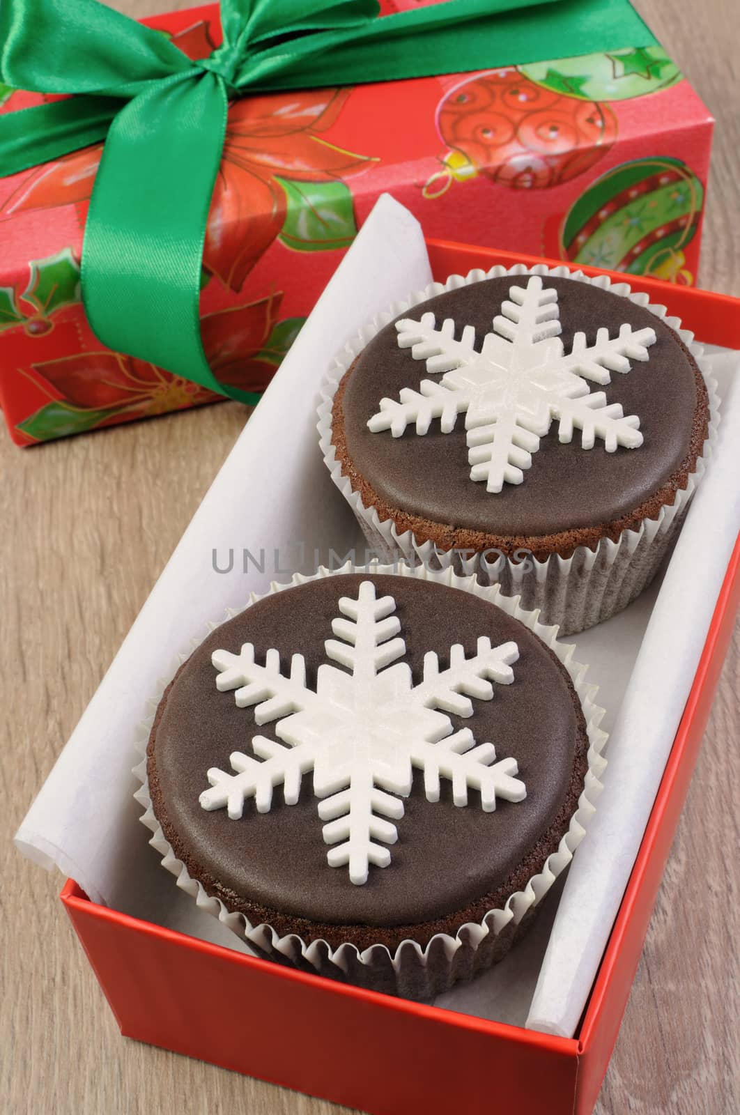 Chocolate Christmas Muffins decorated with marzipan pearl snowflake