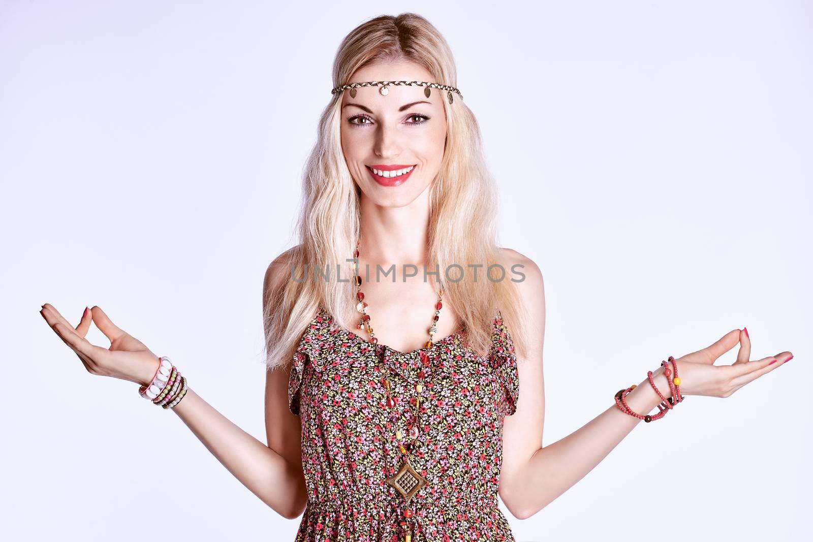 Beauty  portrait of boho woman happy smiling, people, copyspace. Hippie girl meditates, enjoying relax and harmony. Young joyful positive blonde woman in floral fashion sundress doing yoga, having fun