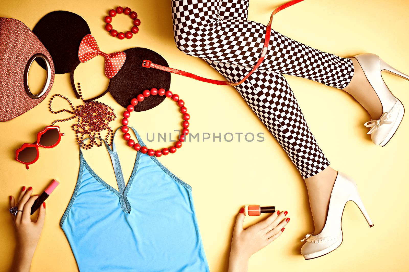 Fashion clothes stylish set, accessories, womans sexy legs, hands, people. Glamor girl, creative look with top, leggings, trendy shoes heels. Vivid party disco unusual style on yellow, copyspace