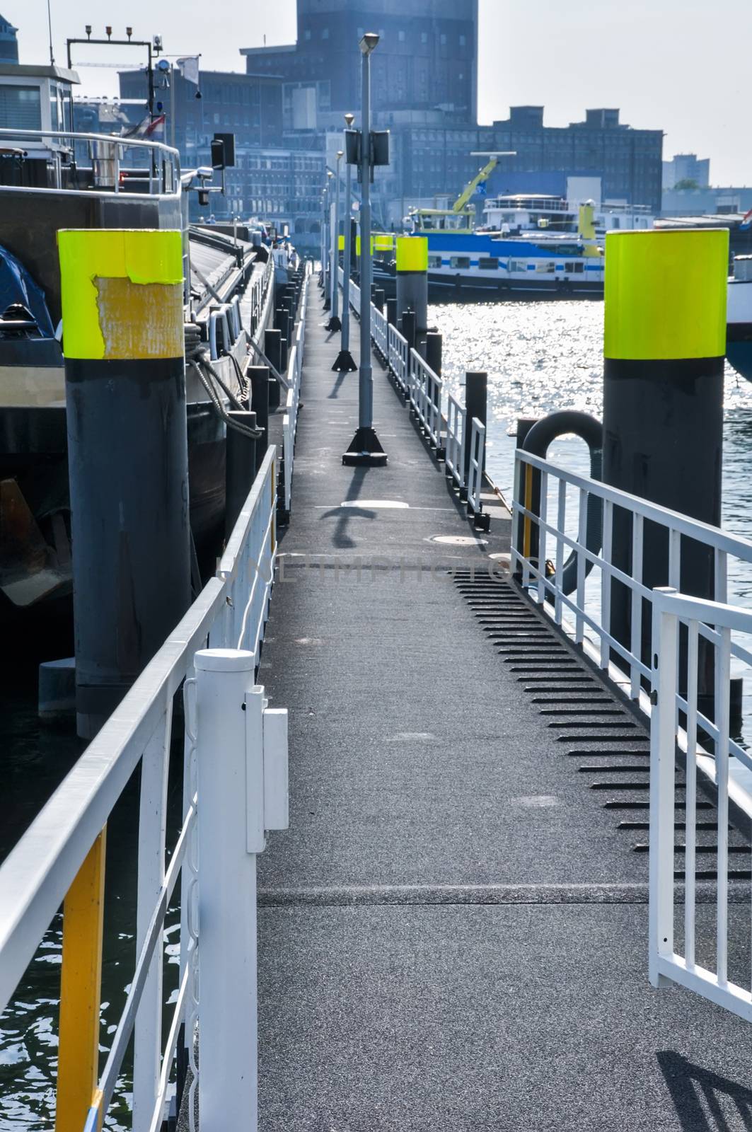 floating dock on Maas river in Rotterdam by vlaru