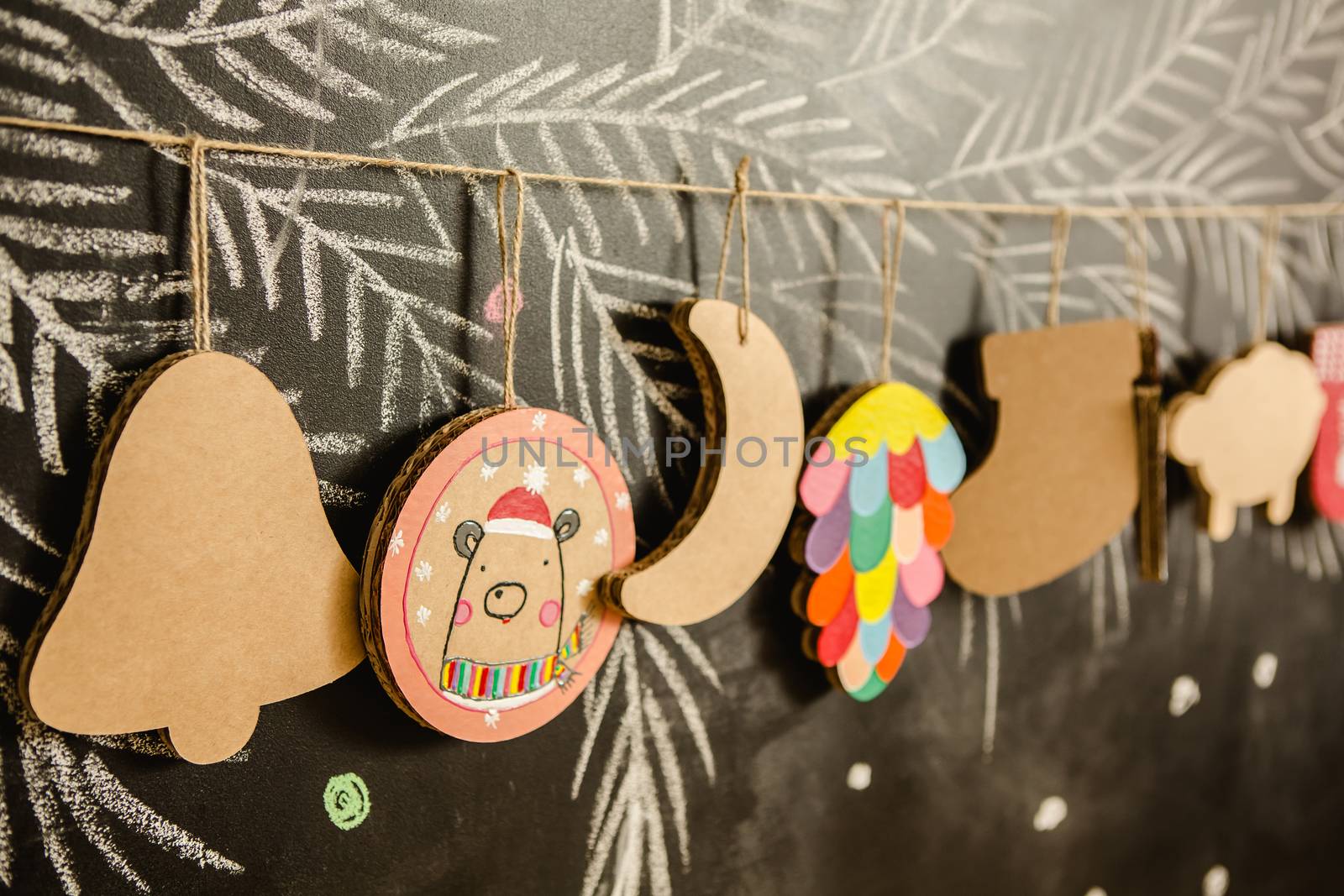 Cardboard toys for the Christmas tree or Christmas garland. Christmas decorations. Selective Focus