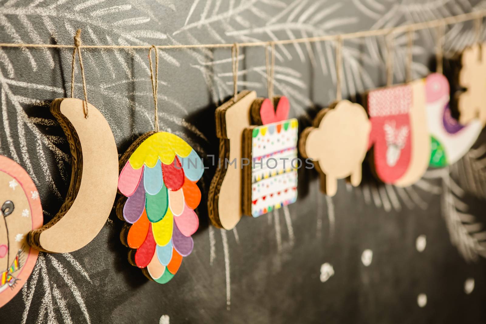 Cardboard toys for the Christmas tree or Christmas garland. Christmas decorations. Selective Focus