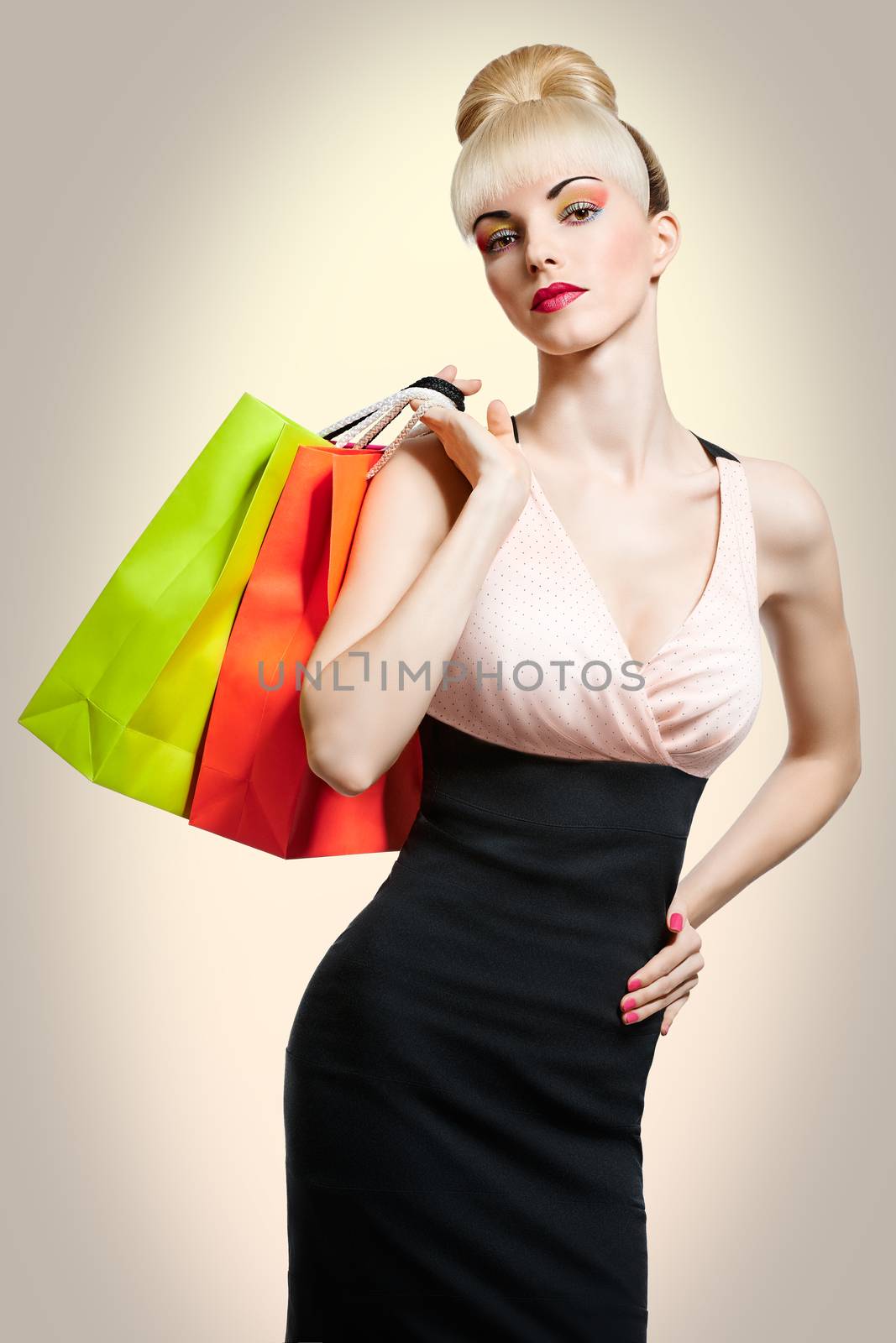 Beautiful fashion woman holds shopping bags.Pinup  by 918