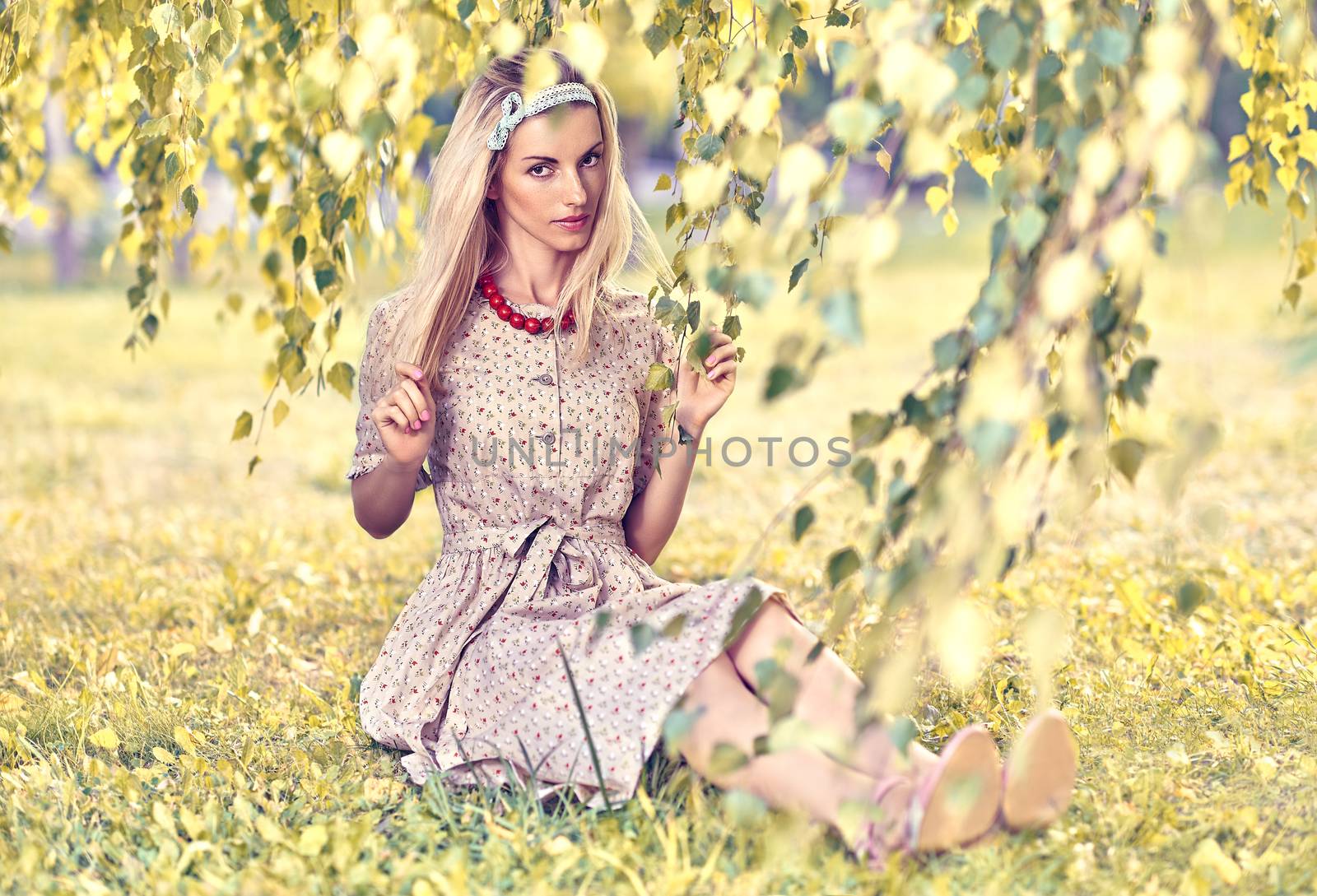Beautiful playful woman under birch tree, outdoors by 918