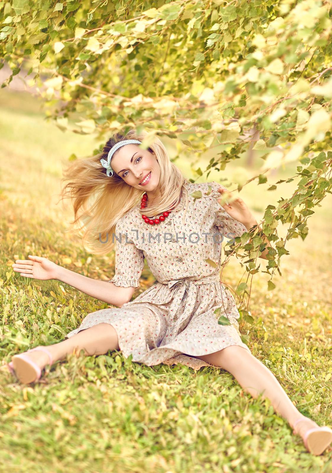 Beautiful playful woman under birch tree, outdoors by 918
