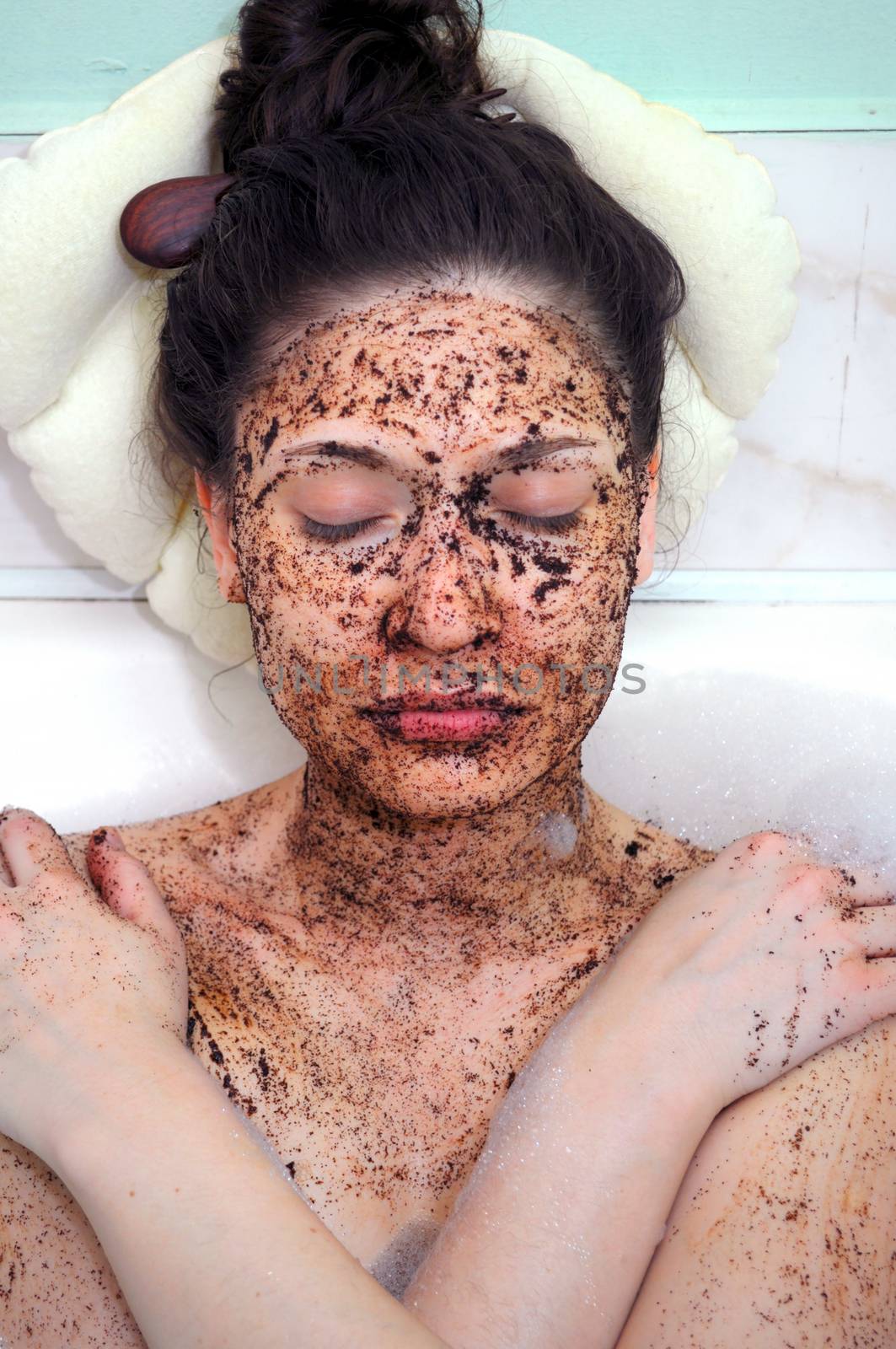 portrait of a girl with eyes closed in a cosmetic mask of coffee by vlaru