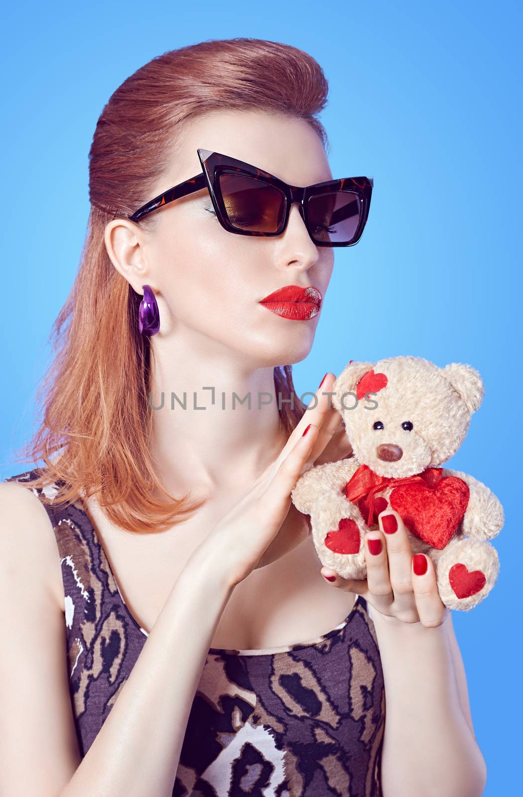 Beauty fashion redhead woman and loving teddy bear by 918
