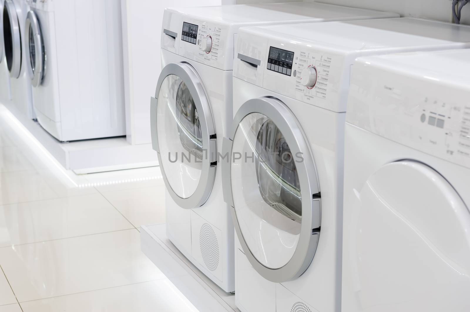 laudry dryers, washing machines and other domestic appliance equipment in the store