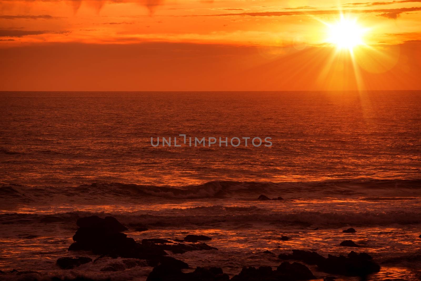Scenic Pacific Ocean Sunset in California, United States.