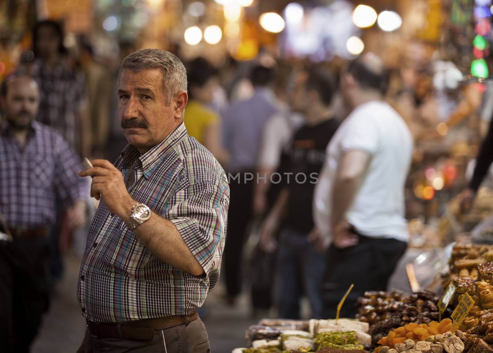 Vendor Smoking in istanbul Spice Market by Creatista