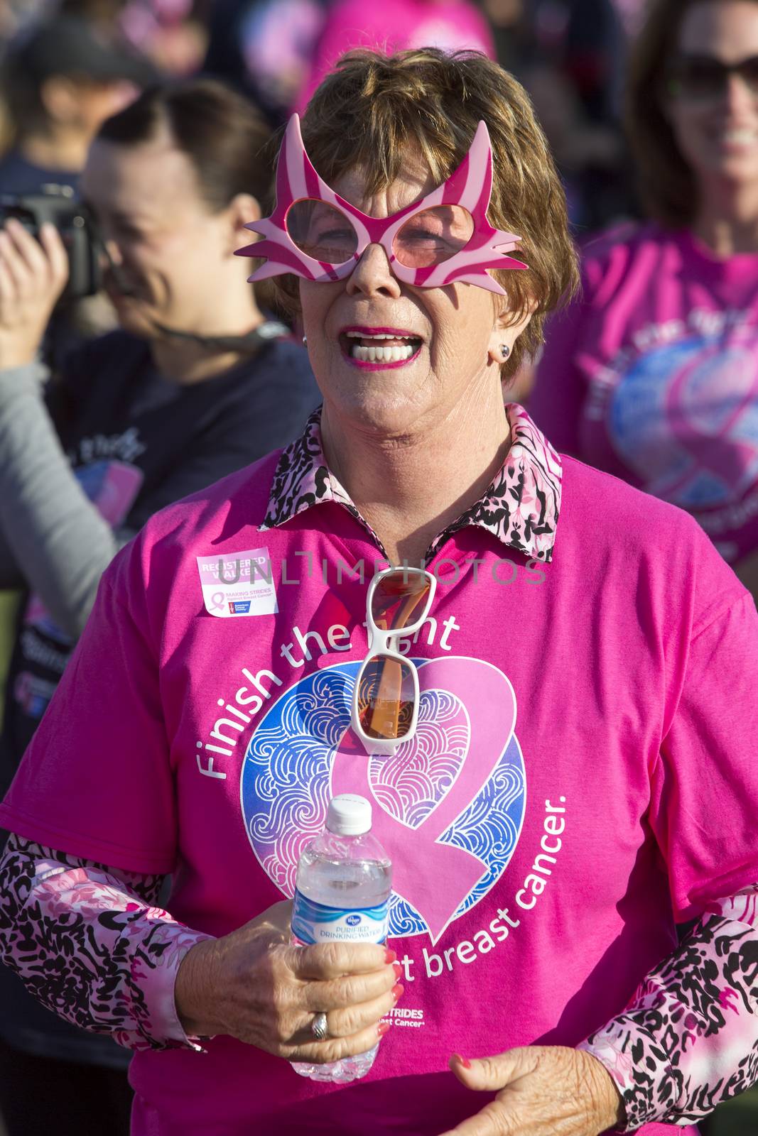 TUCSON, PIMA COUNTY, ARIZONA, USA - OCTOBER 18:  Unidentified woman in the audience before the 2015 American Cancer Society Making Strides Against Breast Cancer walk, on October 18, 2015 in Tucson, Arizona, USA.