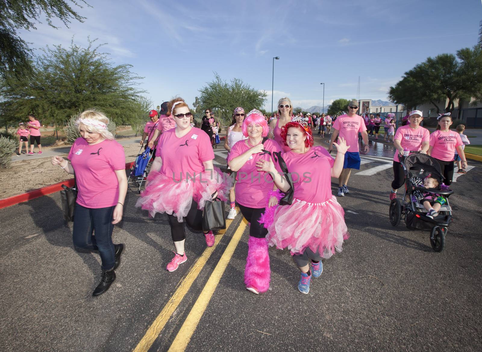 TUCSON, PIMA COUNTY, ARIZONA, USA - OCTOBER 18:  Unidentified women mugging for camera in the 2015 American Cancer Society Making Strides Against Breast Cancer walk, on October 18, 2015 in Tucson, Arizona, USA.