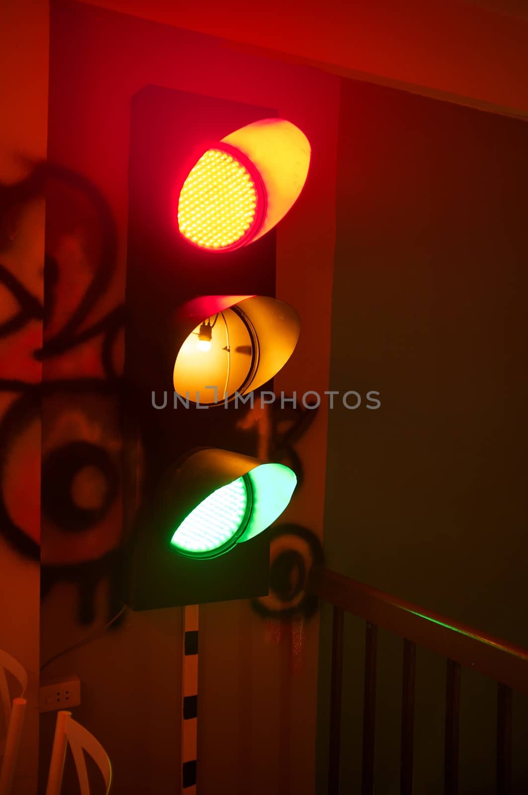 Traffic light glowing of multicolor of green, red and yellow by Hepjam