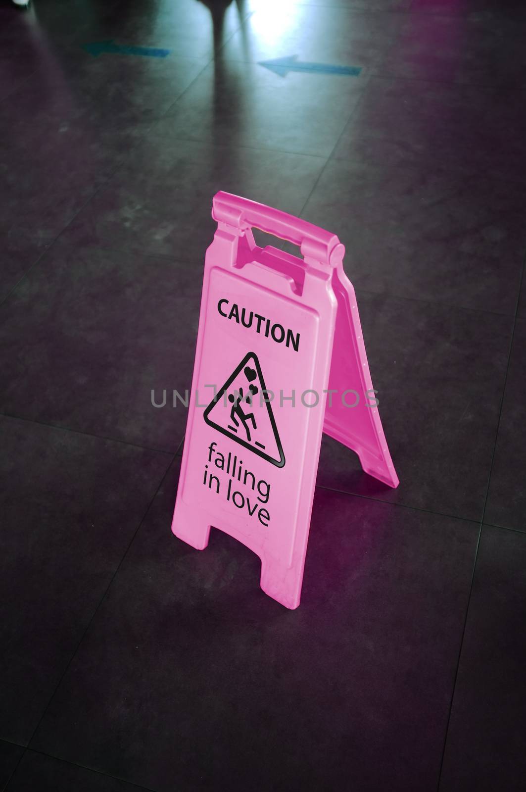 Caution pink sign for warning, falling in love