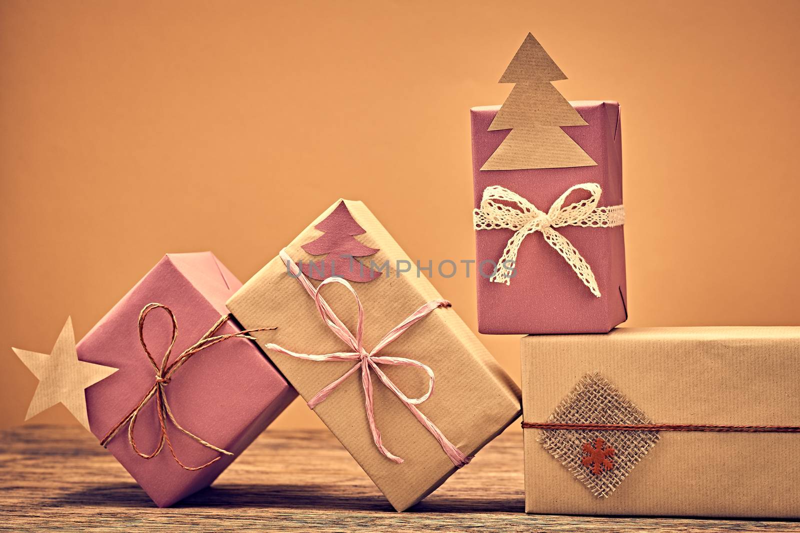 Gift boxes handcraft stack. New Year 2016 on wood by 918