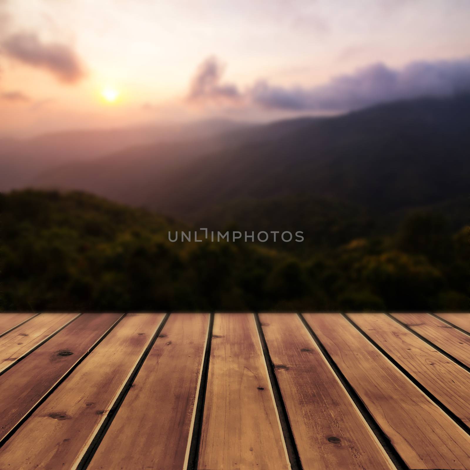 Sunset with mountain and wood floor by liewluck